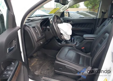 2022 GMC Canyon 2Wd Short Box Denali z USA, uszkodzony, nr VIN 1GTG5EENXN1143797